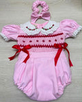 Pink and red trim romper