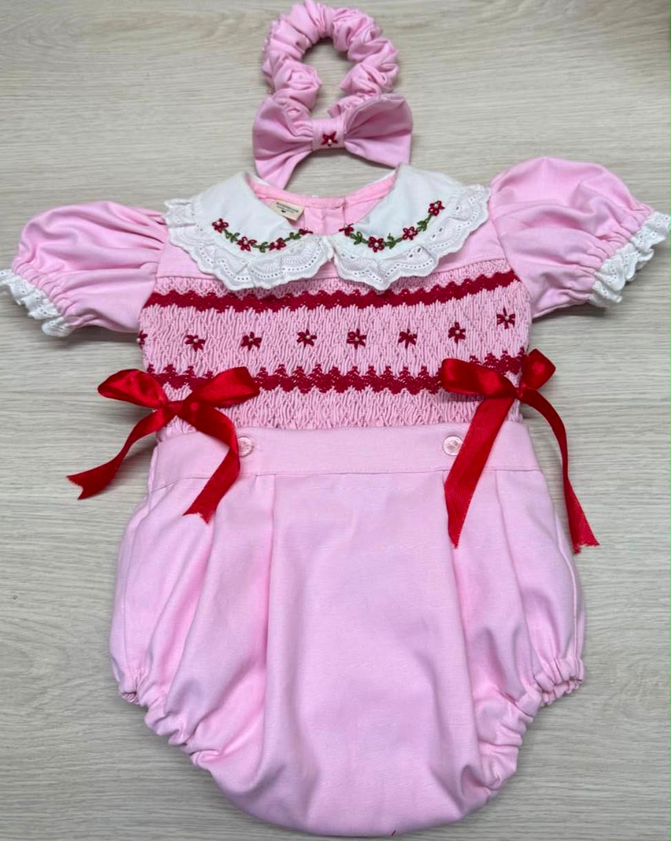 Pink and red trim romper