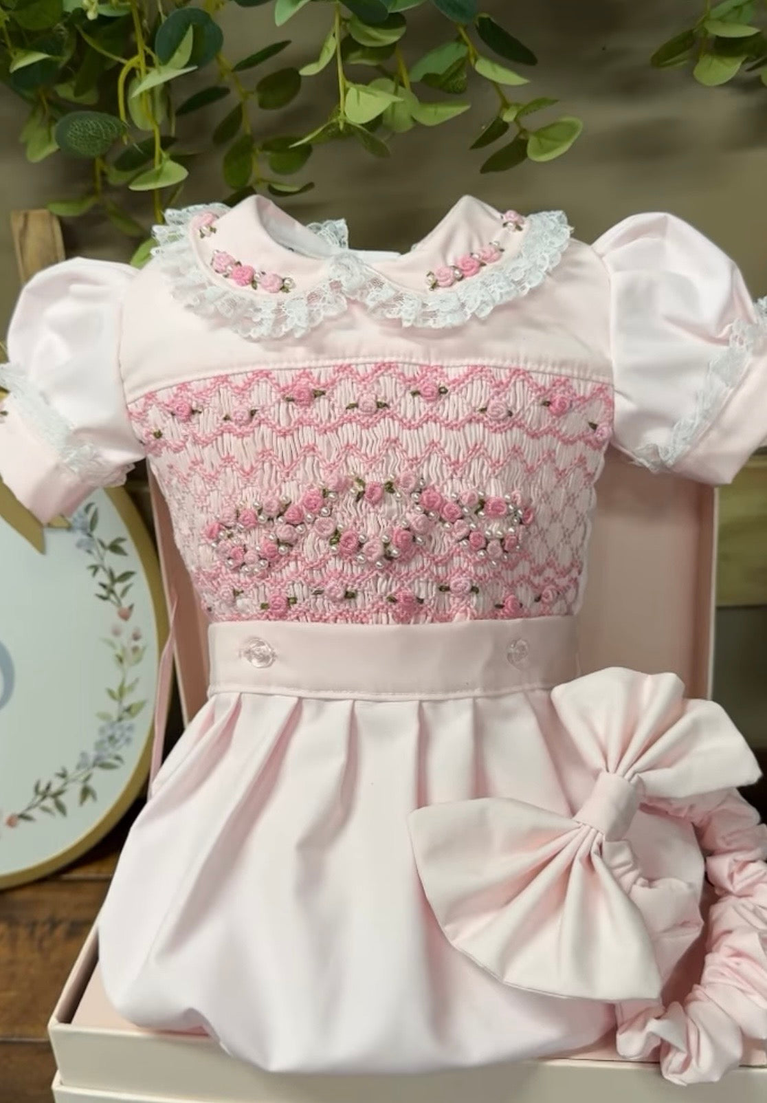 Pink smock romper